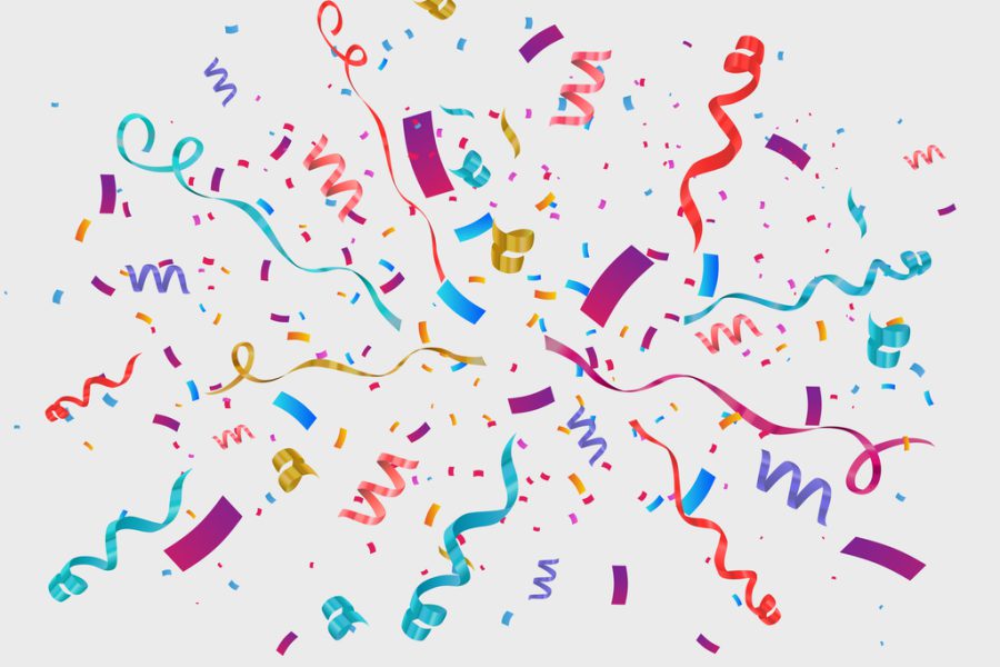 multiple colored confetti sprinkled on a white background