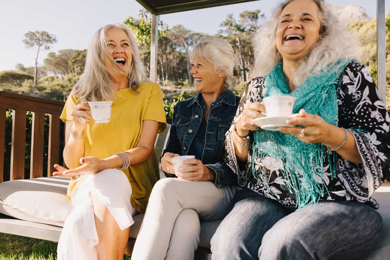 three friends laughing