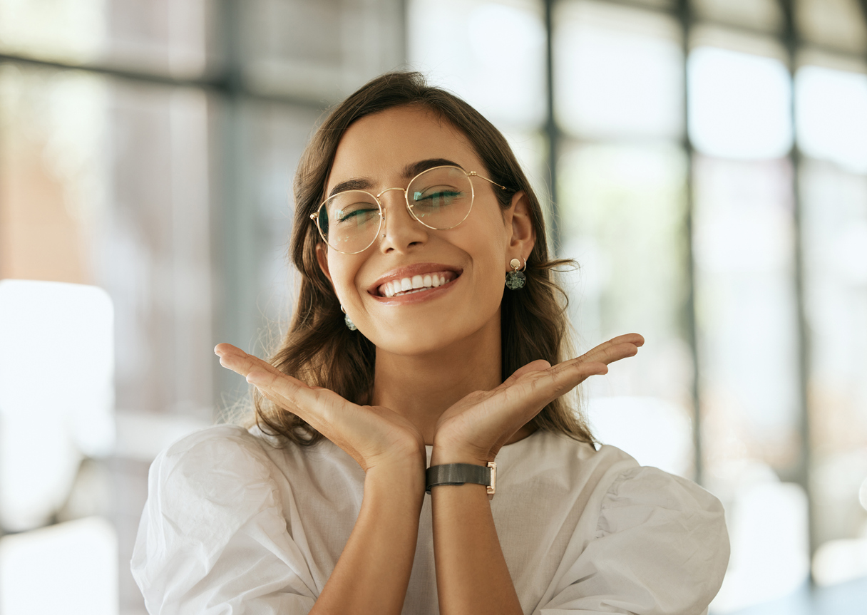 Cheerful business woman with glasses